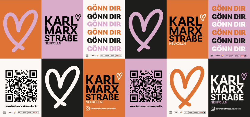 Abbildung einer Plakatwand mit dem Logo der Karl-Marx-Straße, einem Herz sowie dem Spruch "Gönn Dir"